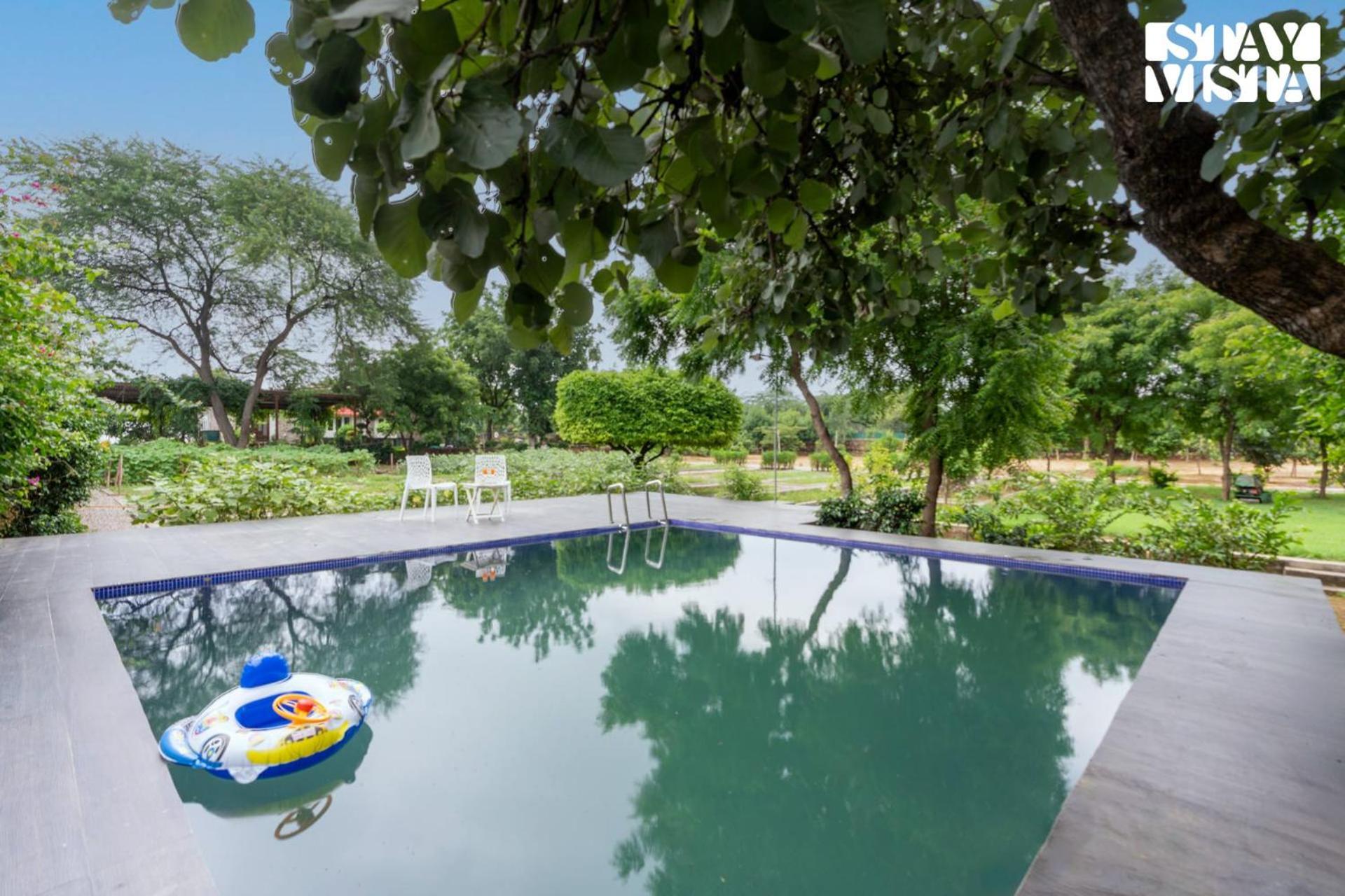 Stayvista At Idyllic Farmhouse - A Glasshouse With Outdoor Pool Gurgaon Bagian luar foto